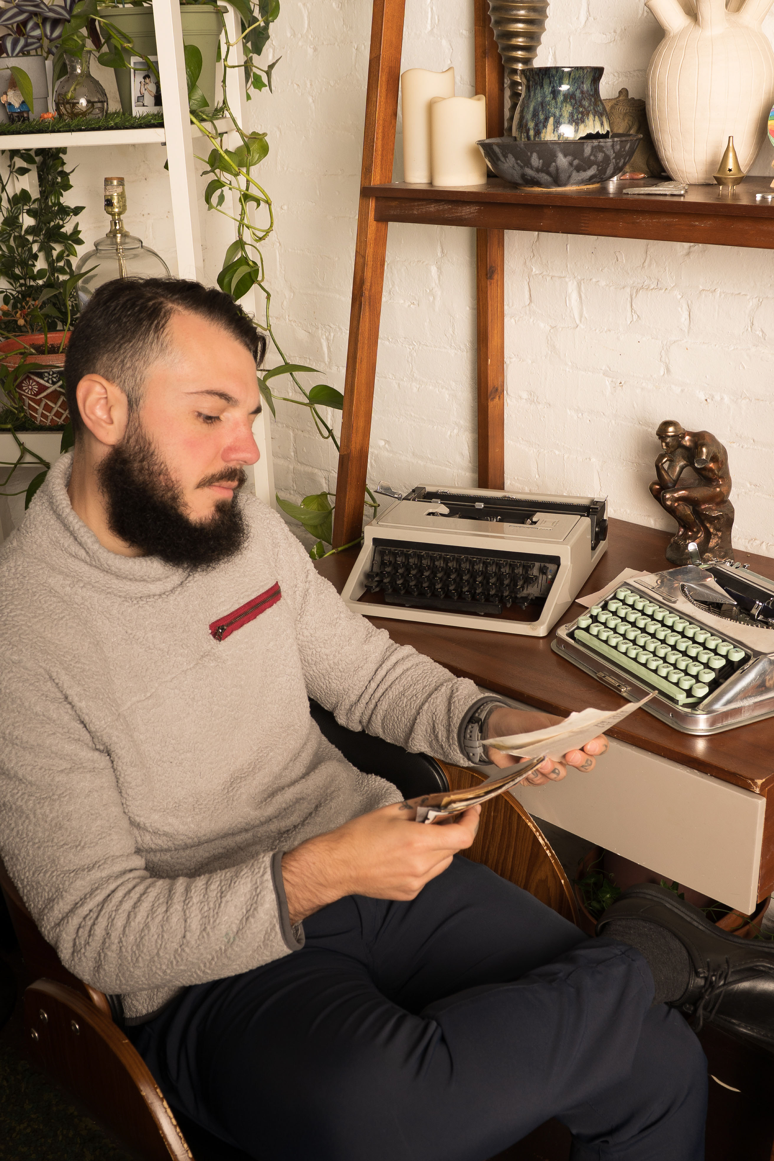 Poet reading in artistic setting